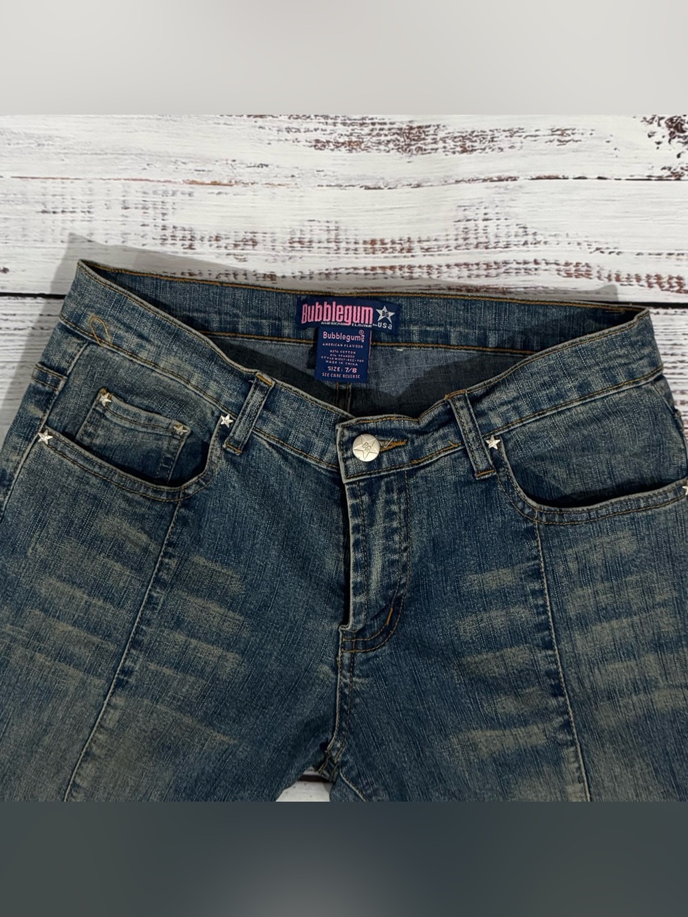 Vintage Y2K Bubblegum Women's Distressed Flared Leg Jeans with Lace Up Detail.